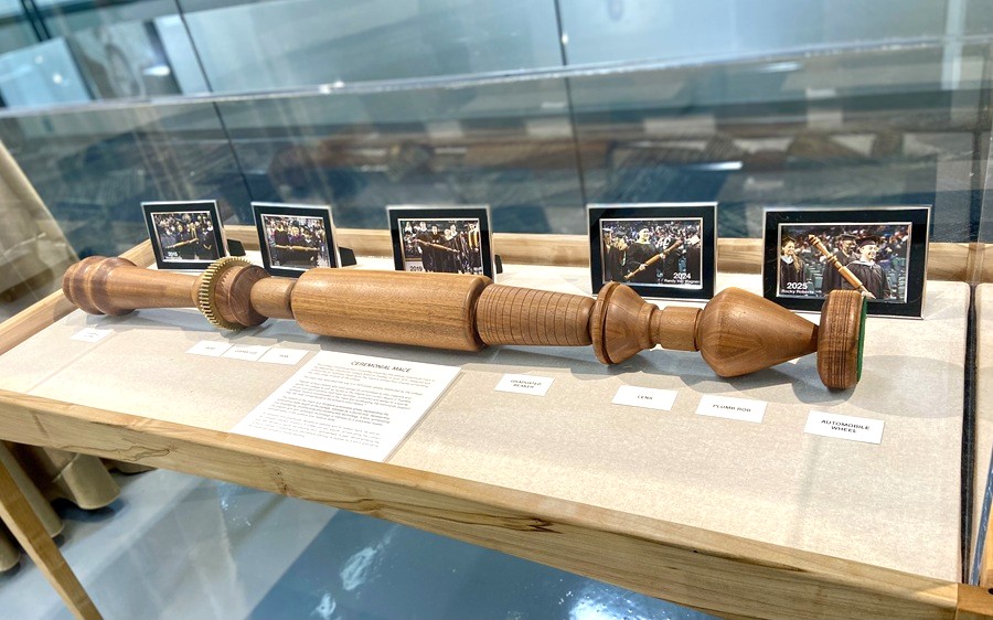 Washtenaw Community College’s ceremonial commencement mace is displayed at the “60 Years of Opening Doors” art gallery exhibition on campus. 